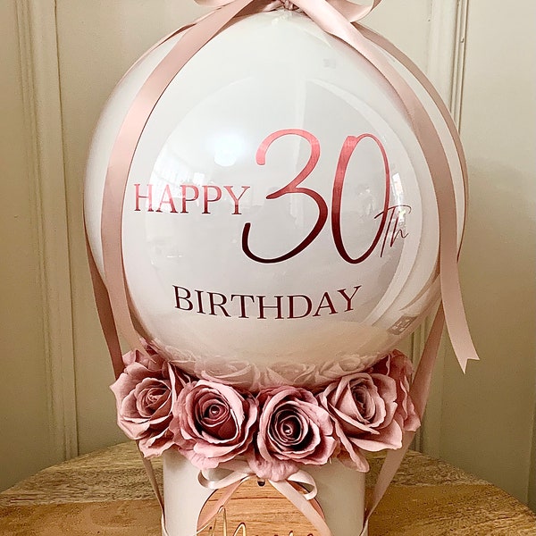 Bobo bubble balloon with silk roses inside a hat box. Rose gold mirrored disc and balloon can be Personalised with any message