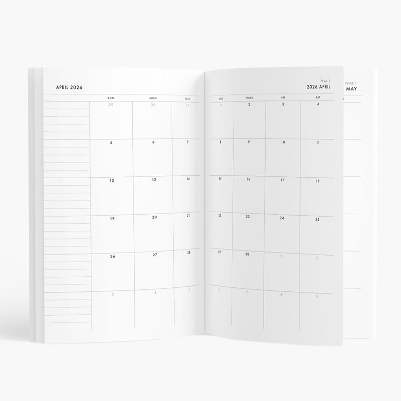 May include: Open planner showing the April 2026 calendar. The left page has lined sections, while the right page displays the days of the month. The calendar is in black and white, with the month and year clearly labeled.