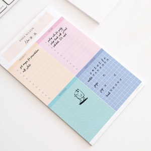 May include: A pastel-colored planner with sections for priority, to-do, habit tracker, and sketches. The planner includes the name "ANNA WILSON" and the dates "Nov 20-26". The to-do list includes "pickup cake for party" and "schedule Dr. appt".
