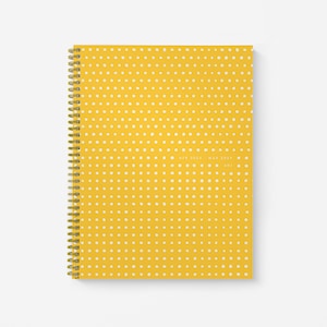 May include: Yellow spiral bound planner with a white polka dot pattern. The cover has the text "APR 2023 - MAR 2024".