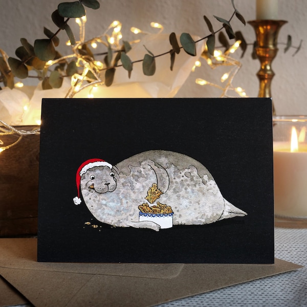 Set: folded Christmas card + envelope, cute seal eating speculoos, A6 postcard