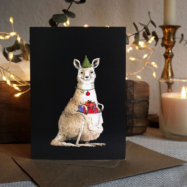 Set: folded Christmas card + envelope, kangaroo with presents, A6 postcard