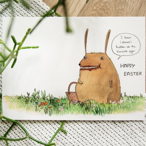 Cartolina di Pasqua A6: Coniglietto pasquale con una certa passione per il cioccolato