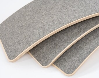 Balance board with a gray felt bottom