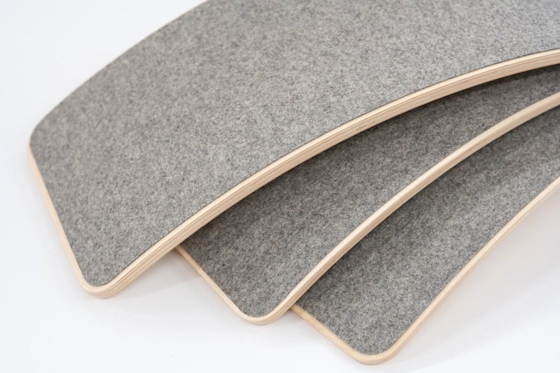 Balance board with a gray felt bottom image 1