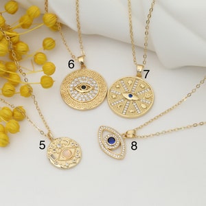 May include: Five gold necklaces with different pendants featuring the evil eye symbol. The pendants are decorated with white stones and blue enamel. The necklaces are numbered 5, 6, 7, and 8.