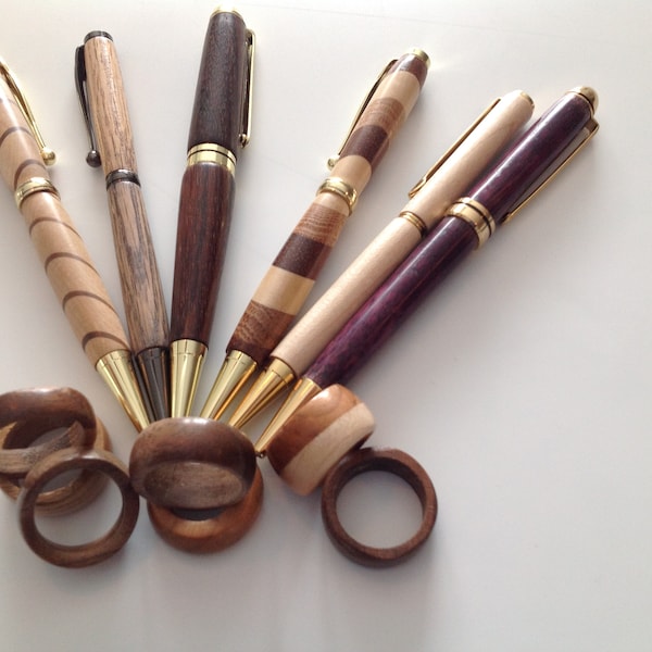 wooden pens and wooded rings  Hand turned Pens and rings good selection of species of wood to choose from and your ring size