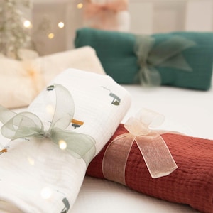 Customizable multi-use double cotton gauze blanket or swaddle