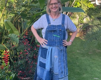 This Denim Overalls Dress is made from recycled denim. It uses just one pair of overalls and many cut denim pieces. Unique and sustainable.