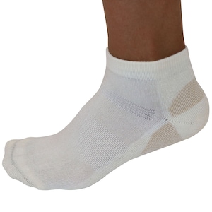 May include: White ankle socks with a reinforced heel and toe. The socks have a breathable mesh design on the top of the foot and a tan accent on the heel.