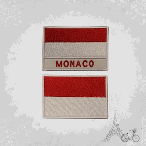Op de afbeelding: Twee geborduurde patches met de vlag van Monaco. De bovenste patch heeft het woord "MONACO" onder de vlag.