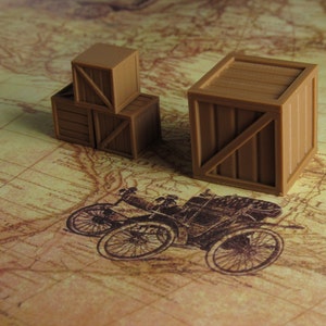 May include: Three wooden boxes, two stacked on top of each other and one on the side, all with a brown finish and a simple design. The boxes are on a textured brown surface.