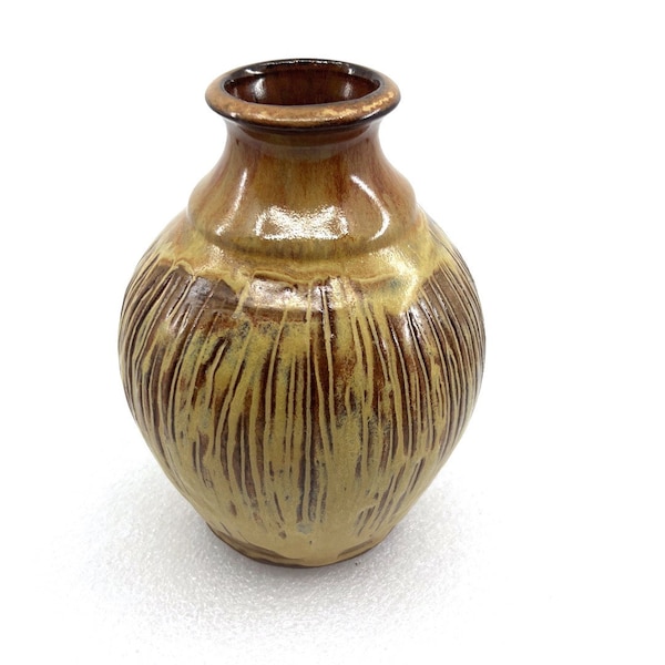 Handmade, wheel thrown, stoneware, ceramic bottle / vase, yellow, rusty reds carved texture.