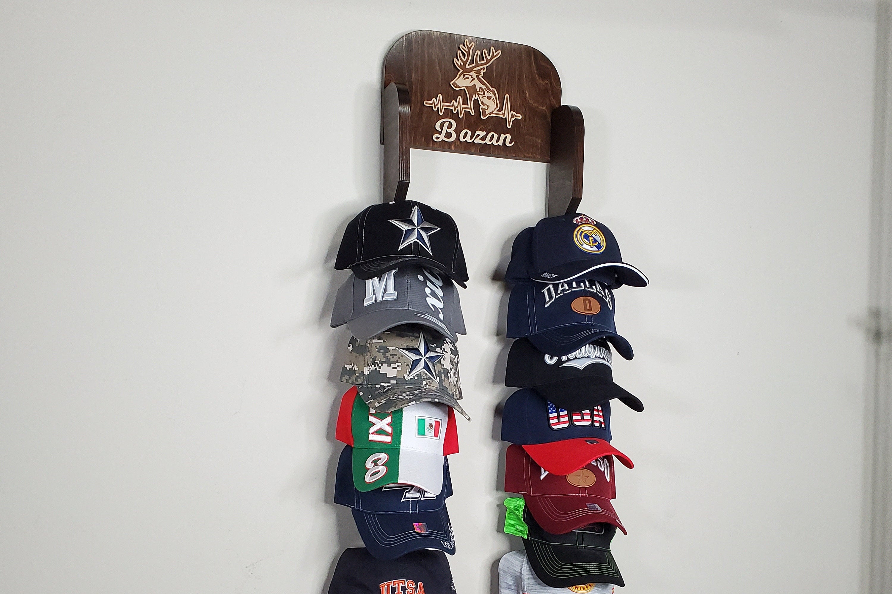 Hanging caps online on wall