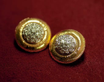 Pendientes vintage de clip redondos en tono dorado de Nina Ricci con cristales