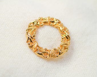 Broche vintage de corona dorada de Monet