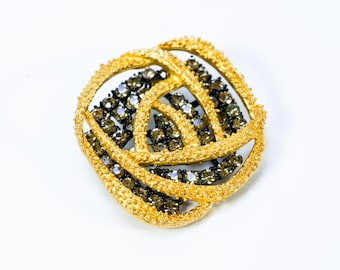 Broche modernista vintage de los años 60 en tono dorado y diamantes de imitación japoneses.