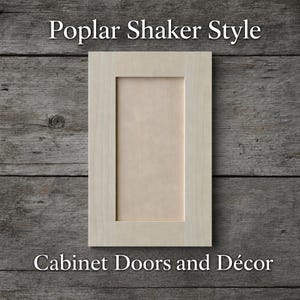 May include: A light-colored wooden cabinet door with a rectangular Shaker-style frame and a flat center panel. The text Poplar Shaker Style and Cabinet Doors and Décor is printed in white above and below the rectangular wooden cabinet door.