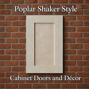 May include: A light-colored Poplar Shaker Style cabinet door against a red brick wall. The door has a recessed panel and a simple, clean design. The text "Poplar Shaker Style" and "Cabinet Doors and Décor" are displayed.