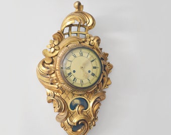 Beautiful wall clock with pendulum | Rococo style | Gilded Cartel clock 33 cm X 59 cm