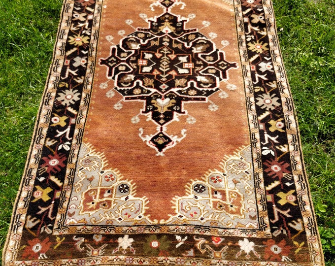 Vintage Handmade Afghan Wool Rug | 111 x 194 cm | Carpet with Brown, Cream and Black Geometric Medallions Floral