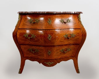 This furniture maybe ordered Only by prior arrangement.    Rococo revival Bombe Kingwood Mahogany Chest of Drawers