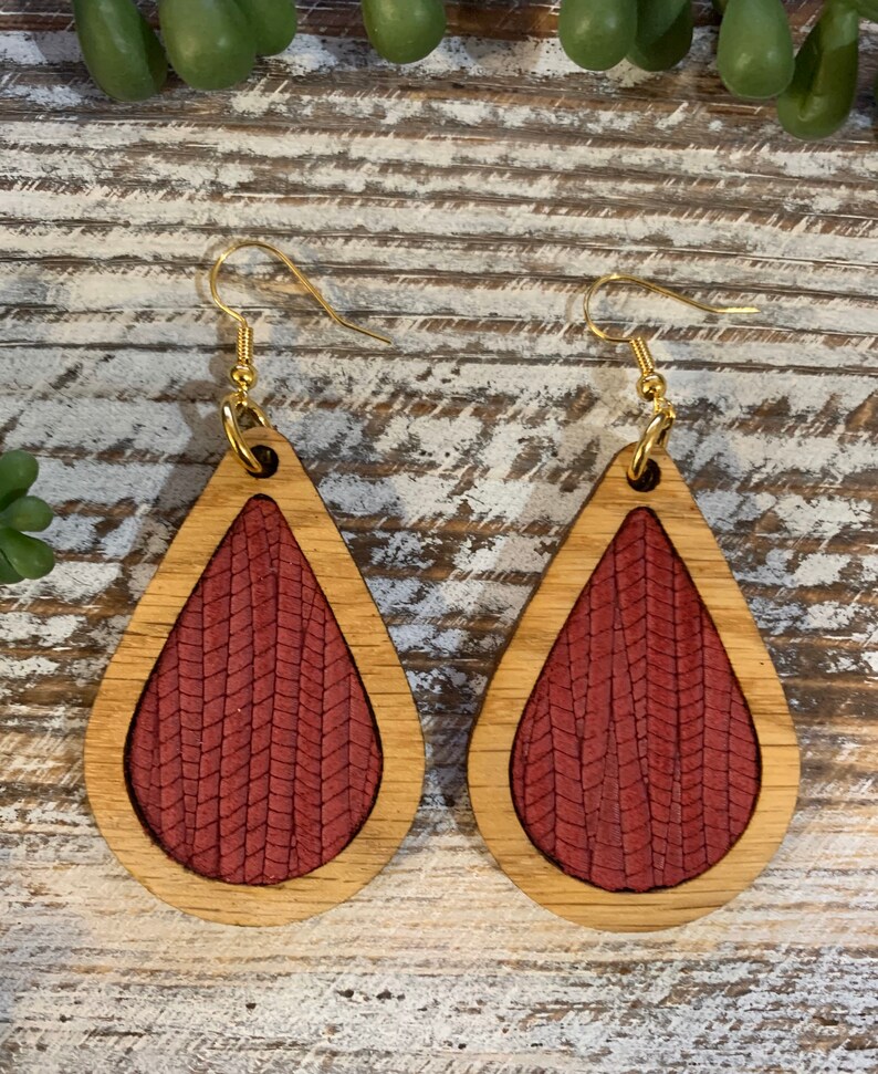Wood and palm leaf burgundy genuine leather teardrop earrings Handmade by Got You Hooked Designs.