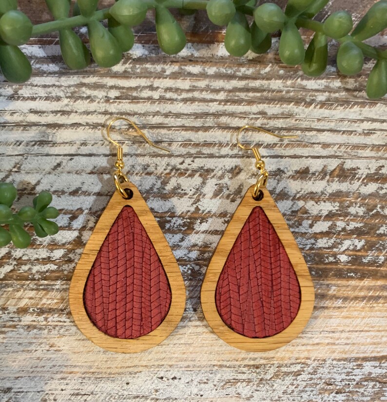 Wood and palm leaf burgundy genuine leather teardrop earrings Handmade by Got You Hooked Designs.