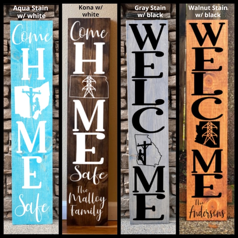 May include: Four wooden welcome signs with different stain colours and text. The signs read "Come Home Safe", "Welcome", and "Welcome". The signs are decorated with a power line and lineman graphic.