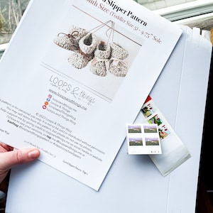 May include: A printable crochet pattern for toddler-sized slippers. The pattern is for personal use only and includes instructions for crocheting the slippers. The pattern is from Loops & Things Wpg, a crafting business that sells crochet patterns.