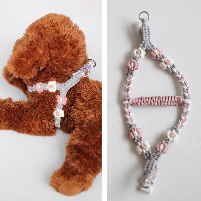 May include: A gray and pink macrame dog harness with flower accents. The harness is shown on a brown stuffed dog.