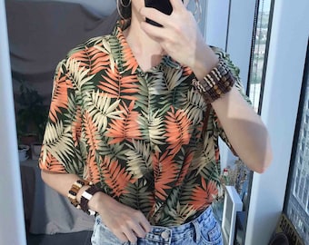 Vintage 90s unisex tropical Hawaii shirt / Leaf pattern beach vibes floral shirt / Orange green black blouse / Size medium large