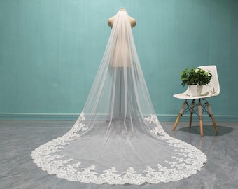 Velo de novia estilo catedral, encaje color marfil, una capa.