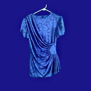 Ultra-soft satined post-modern polyester top