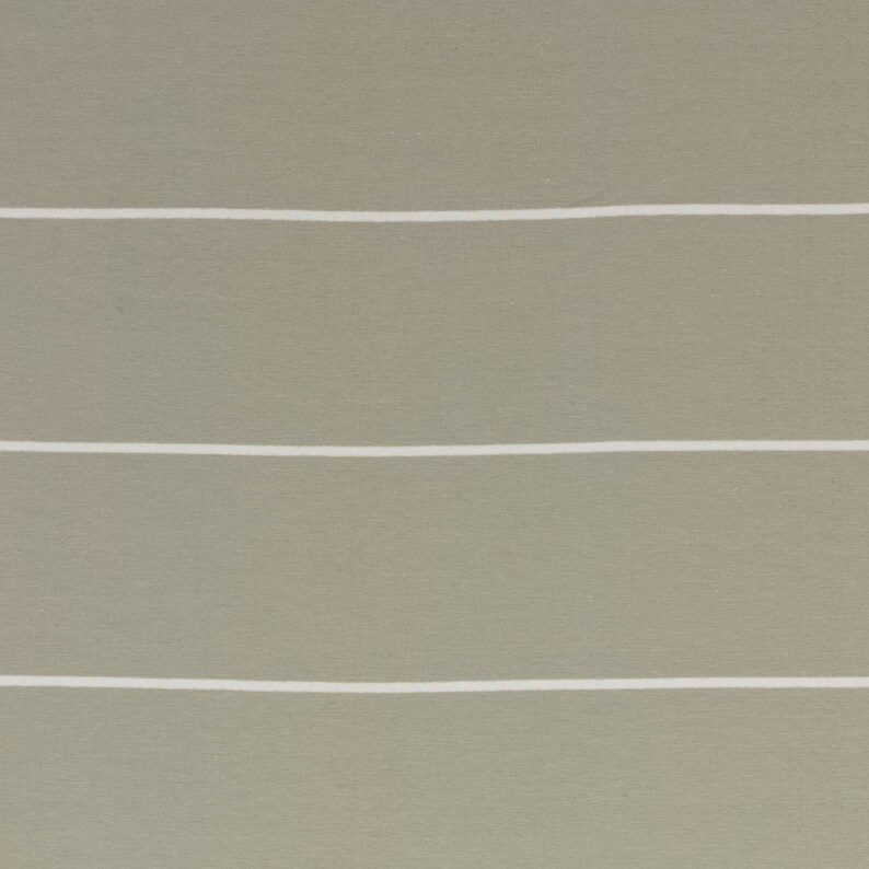 May include: A close-up of a light grey fabric with white horizontal stripes. The fabric has a subtle texture.