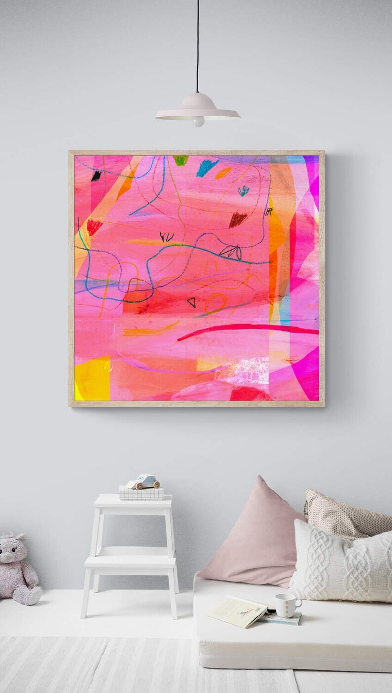 May include: Abstract painting in a wooden frame with pink, orange, yellow, blue, and red colors. The painting features lines, shapes, and textures.