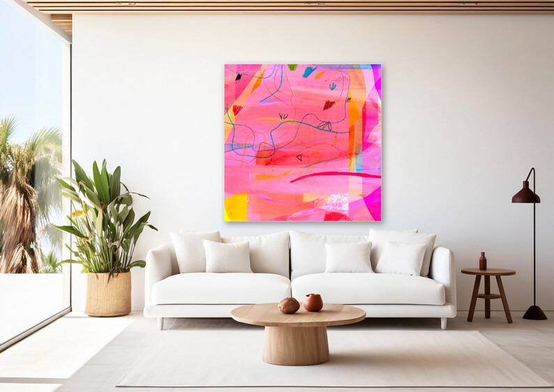 May include: Abstract painting with pink, red, orange, yellow, blue, and green colors. The painting has a white background and is framed in a white frame.