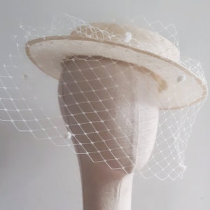 Sinamay boater hat with veiling