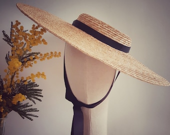 Wide brimmed natural straw boater hat