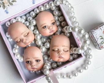 4 rostos de boneca para fazer bonecas de pelúcia. 2 rostos que dormem e 2 rostos com olhos abertos. Partes esculturais do corpo da boneca