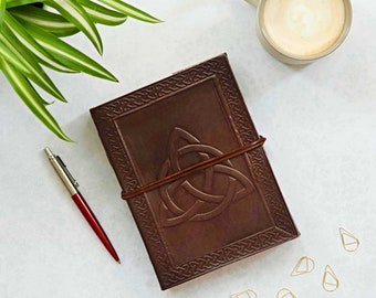 Celtic Symbols Leather Journal: Embossed Recycled Paper Notebook