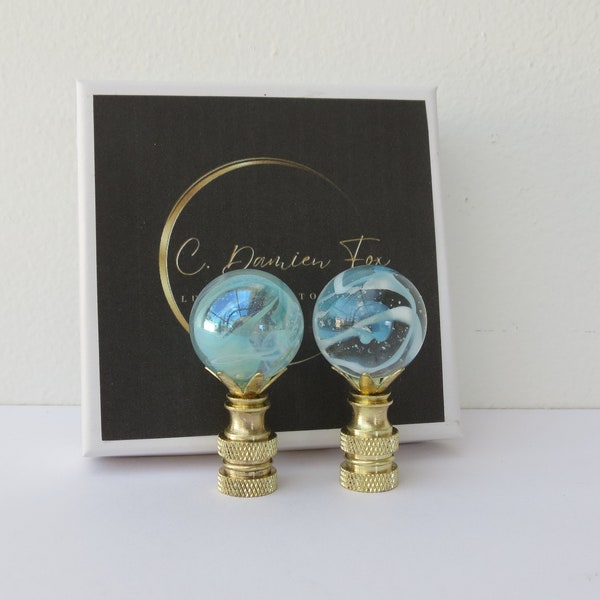 Iridescent Sky Blue and White Swirl Murano Glass Ball Table Lamp Finials, a pair.