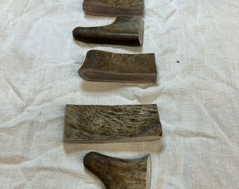 May include: Five different sizes of antler dog chews. The antler chews are all natural and come in various shapes and sizes.