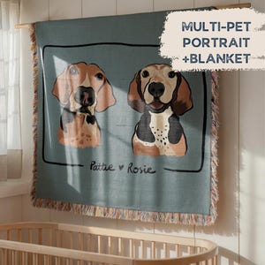 May include: A blue-green woven blanket featuring a portrait of two dogs. The dogs are brown, black, and white, with the names "Pattie" and "Rosie" below. The blanket has a fringed edge and the text "MULTI-PET PORTRAIT + BLANKET".