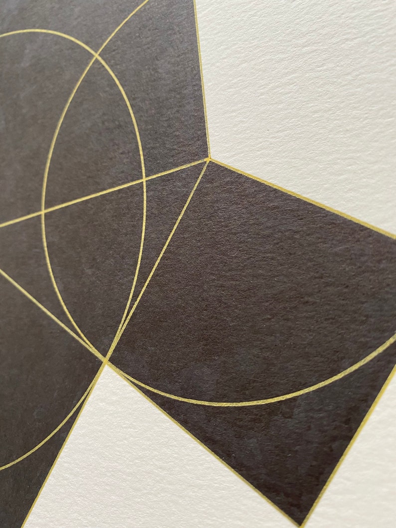 May include: A geometric design with black and gold shapes. The design features a series of overlapping circles and squares with gold lines.