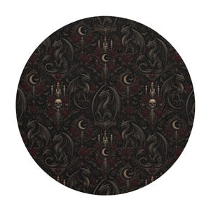 May include: A circular fabric pattern featuring a repeating dark motif of winged dragons, human skulls, lit candelabras, and crescent moons interspersed with deep red roses against a black background in a damask-style arrangement.