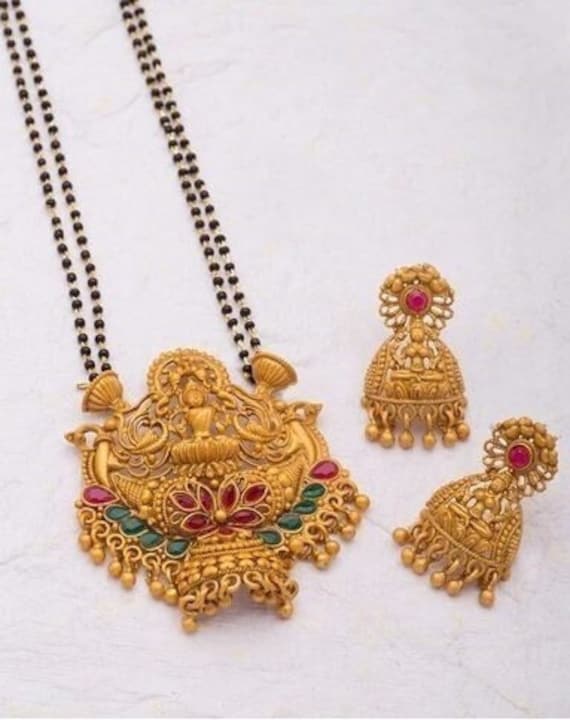 Temple gold mangalsutra designs discount