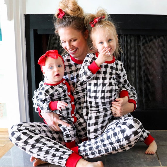 baby and child matching christmas pjs