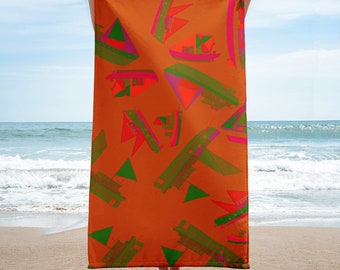 Könnte beinhalten: Orangefarbenes Strandtuch mit einem sich wiederholenden Muster aus grünen, rosa und roten abstrakten Booten.