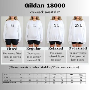 May include: Size chart for Gildan 18000 crewneck sweatshirts in sizes S to 5XL. The chart shows width, length, and sleeve length measurements in inches. The chart also includes descriptions of the fit for each size: Fitted, Regular, Relaxed, and Oversized.